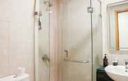 In-room Bathroom 7 Elegant and Strategic 1BR The Mansion Kemayoran Apartment near JIEXPO By Travelio
