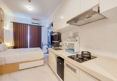 Bedroom 7 Cozy and Homey Studio Sky House BSD Apartment near AEON By Travelio