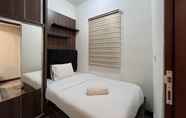 Bedroom 2 Cozy and Warm 2BR Vida View Makassar Apartment By Travelio