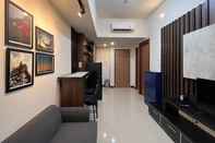 Lobby Cozy and Warm 2BR Vida View Makassar Apartment By Travelio