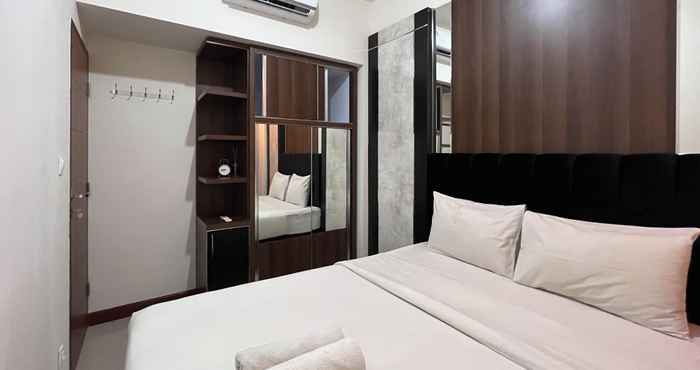 Kamar Tidur Cozy and Warm 2BR Vida View Makassar Apartment By Travelio