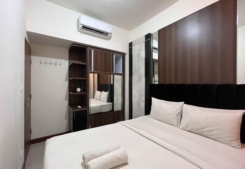 Bedroom Cozy and Warm 2BR Vida View Makassar Apartment By Travelio