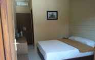 Bedroom 5 Roemah Kita Hotel