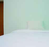 ห้องนอน 4 Good and Coolest 2BR Green Bay Condominium Apartment with Sea View By Travelio