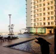 Luar Bangunan 2 Good and Coolest 2BR Green Bay Condominium Apartment with Sea View By Travelio