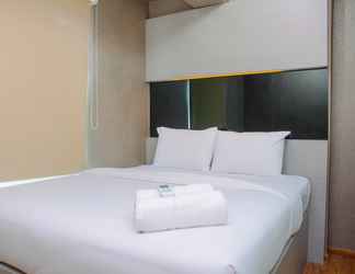 Bedroom 2 2BR with Sea View at Green Bay Pluit Apartment By Travelio