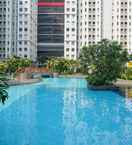 SWIMMING_POOL 2BR with Sea View at Green Bay Pluit Apartment By Travelio