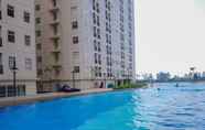 Swimming Pool 2 Comfy and Cozy Studio Apartment at Ayodhya Residences By Travelio 