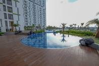 Swimming Pool Homey with Studio Room at Akasa Pure Living BSD Apartment By Travelio