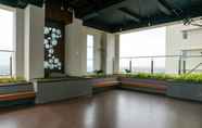 Bangunan 5 Modern 1BR at Puri Orchard Apartment By Travelio