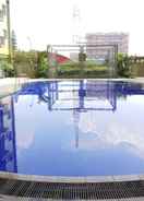 SWIMMING_POOL Relaxing and Trendy 2BR Apartment at The Suite Metro By Travelio