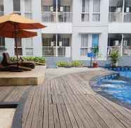 Swimming Pool 2 Stylish Studio Skylounge Tamansari Apartment By Travelio