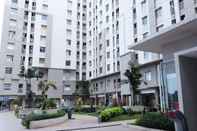 Lobby Homey and Posh 2BR Apartment at Green Bay Pluit By Travelio