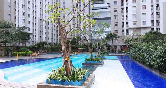 Kolam Renang Homey and Posh 2BR Apartment at Green Bay Pluit By Travelio