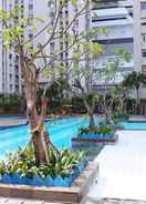 SWIMMING_POOL Homey and Posh 2BR Apartment at Green Bay Pluit By Travelio