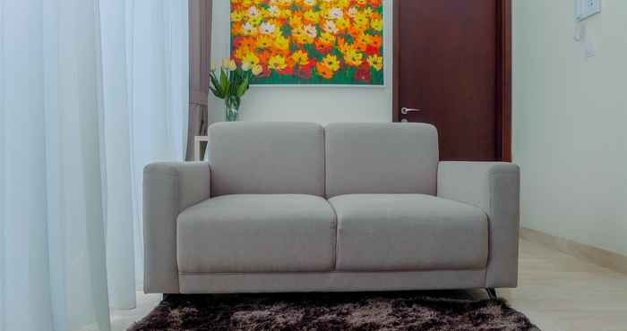 Lobby 2BR with Private Lift at Menteng Park Apartment By Travelio