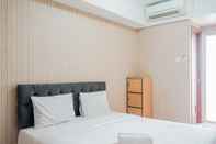 Kamar Tidur Posh Studio Green Lake View Apartment By Travelio