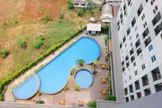 Swimming Pool 4 Highest Value Studio Room at Parkland Avenue Apartment By Travelio