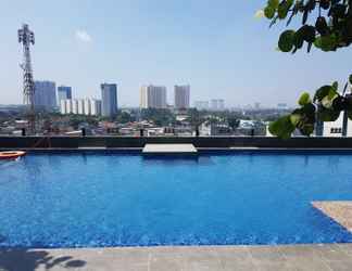 Kolam Renang 2 Cozy and Classic Studio Apartment at Tree Park City By Travelio