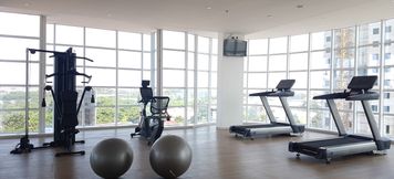 Fitness Center 4 Cozy and Classic Studio Apartment at Tree Park City By Travelio