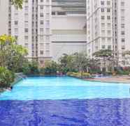 Swimming Pool 2 Green Bay Pluit Apartment Studio with 2 Single Beds By Travelio