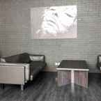 LOBBY Glam Studio with Sofa Bed at Brooklyn Alam Sutera Apartment By Travelio