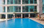 Swimming Pool 3 Glam Studio with Sofa Bed at Brooklyn Alam Sutera Apartment By Travelio