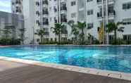 Swimming Pool 4 Homey 2BR Apartment at Signature Park Grande By Travelio