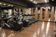 Fitness Center Homey 2BR Apartment at Signature Park Grande By Travelio