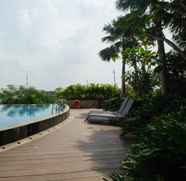 Swimming Pool 3 Furnished Studio Room at Mustika Golf Residence Apartment By Travelio