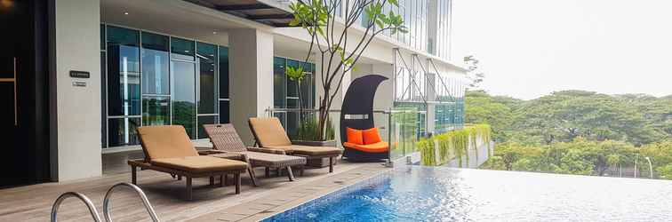 Lobby Cozy 1BR at Brooklyn Apartment near IKEA Alam Sutera By Travelio