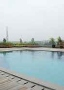 SWIMMING_POOL Cozy Studio near ICE BSD at Tree Park Apartment By Travelio