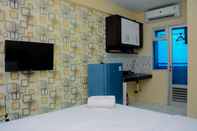 Bedroom Minimalist Studio Apartment at Gading Nias By Travelio