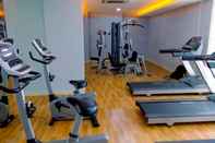 Fitness Center Comfy and Wonderful 2BR Apartment at Bassura City By Travelio