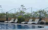 Swimming Pool 4 Spacious Studio Belmont Residence Puri Apartment By Travelio