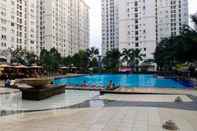 Swimming Pool Modern and Cozy 3BR Apartment Green Palace Kalibata By Travelio