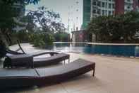 Luar Bangunan Comfy Studio Apartment at Woodland Park Residence By Travelio