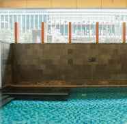 Swimming Pool 3 Homey and Suite 3BR Kemang Village Apartment By Travelio