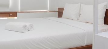 寝室 5 Comfy with Town View Apartment Studio @ Patraland Urbano By Travelio