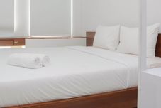 寝室 Comfy with Town View Apartment Studio @ Patraland Urbano By Travelio