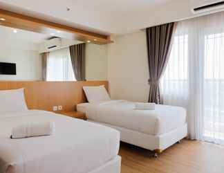 Kamar Tidur 2 Cozy Twin Bed Studio Room at Annora Living Apartment By Travelio