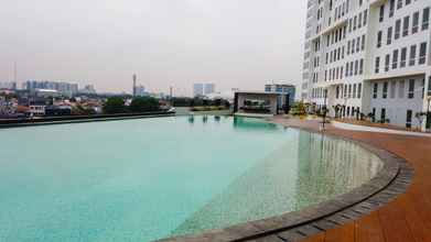 Kolam Renang 4 Homey Studio Room at Patraland Urbano Apartment By Travelio