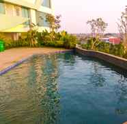 Swimming Pool 2 Simply Studio Apartment at Grand Kamala Lagoon By Travelio