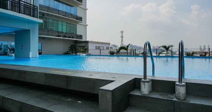 Swimming Pool Beautiful 2BR at Pasar Baru Mansion Apartment By Travelio