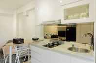 Common Space Stylish and Comfy 2BR Bassura City Apartment By Travelio