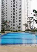 SWIMMING_POOL Stylish and Comfy 2BR Bassura City Apartment By Travelio