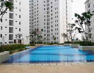 Kolam Renang 2 Stylish and Comfy 2BR Bassura City Apartment By Travelio