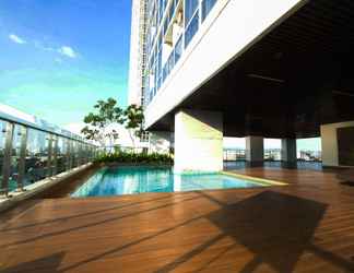 Swimming Pool 2 Brand New Studio at Menteng Park Apartment By Travelio