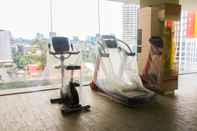 Fitness Center Furnished 2BR at Elpis Apartment By Travelio