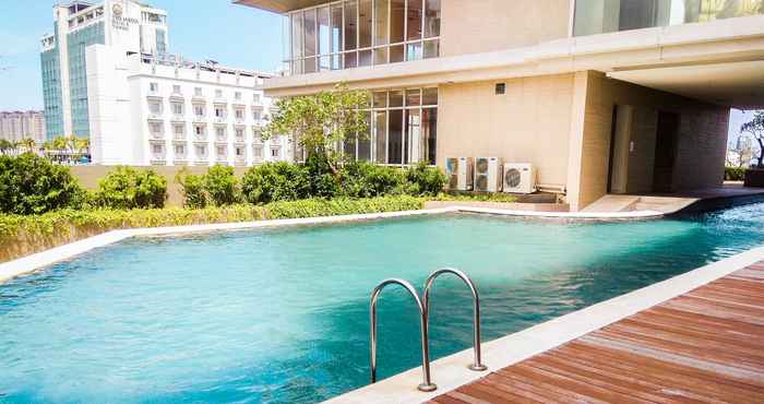 Swimming Pool Furnished 2BR at Elpis Apartment By Travelio